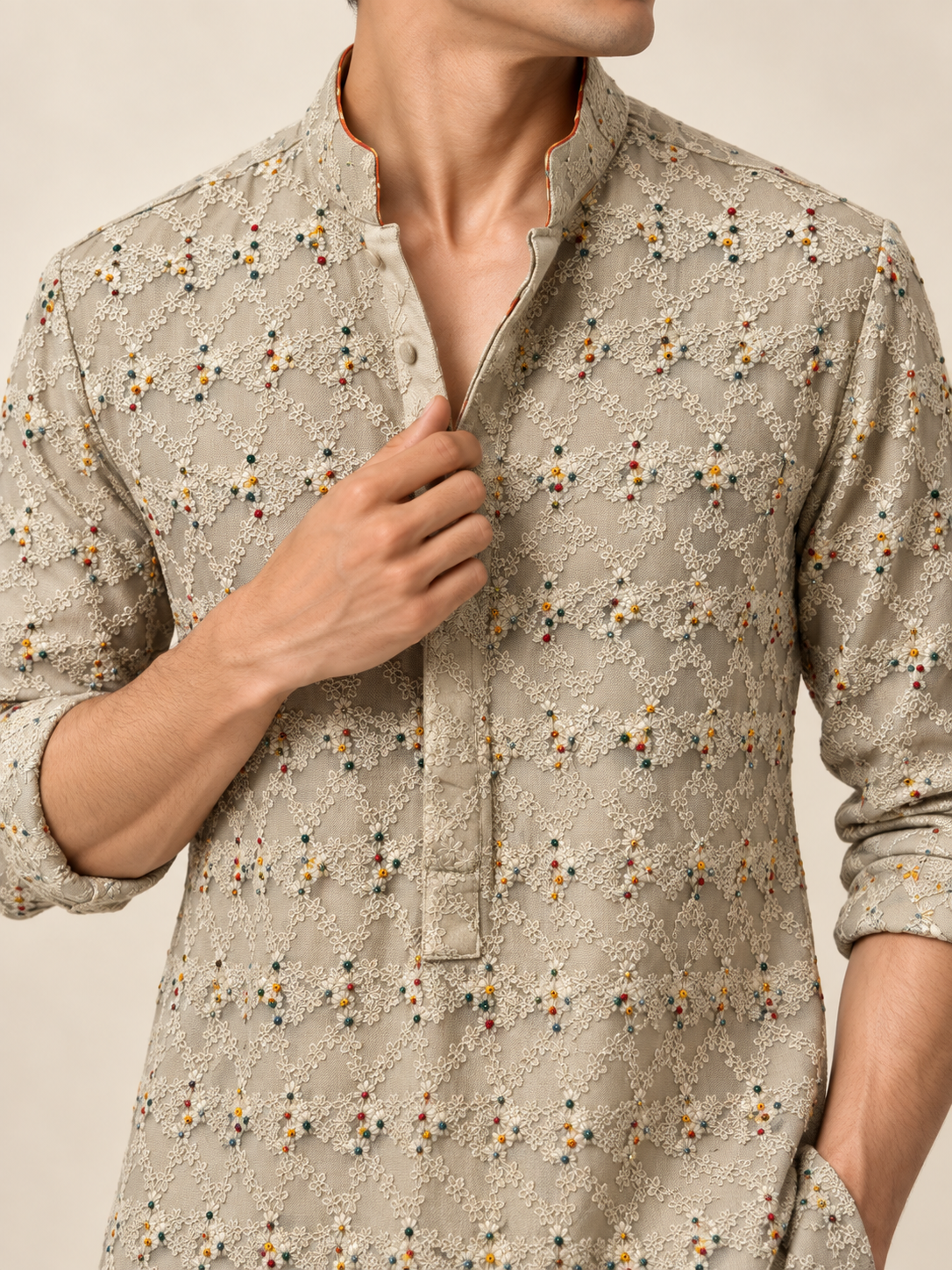 Close-up of beige hand-embroidered georgette kurta