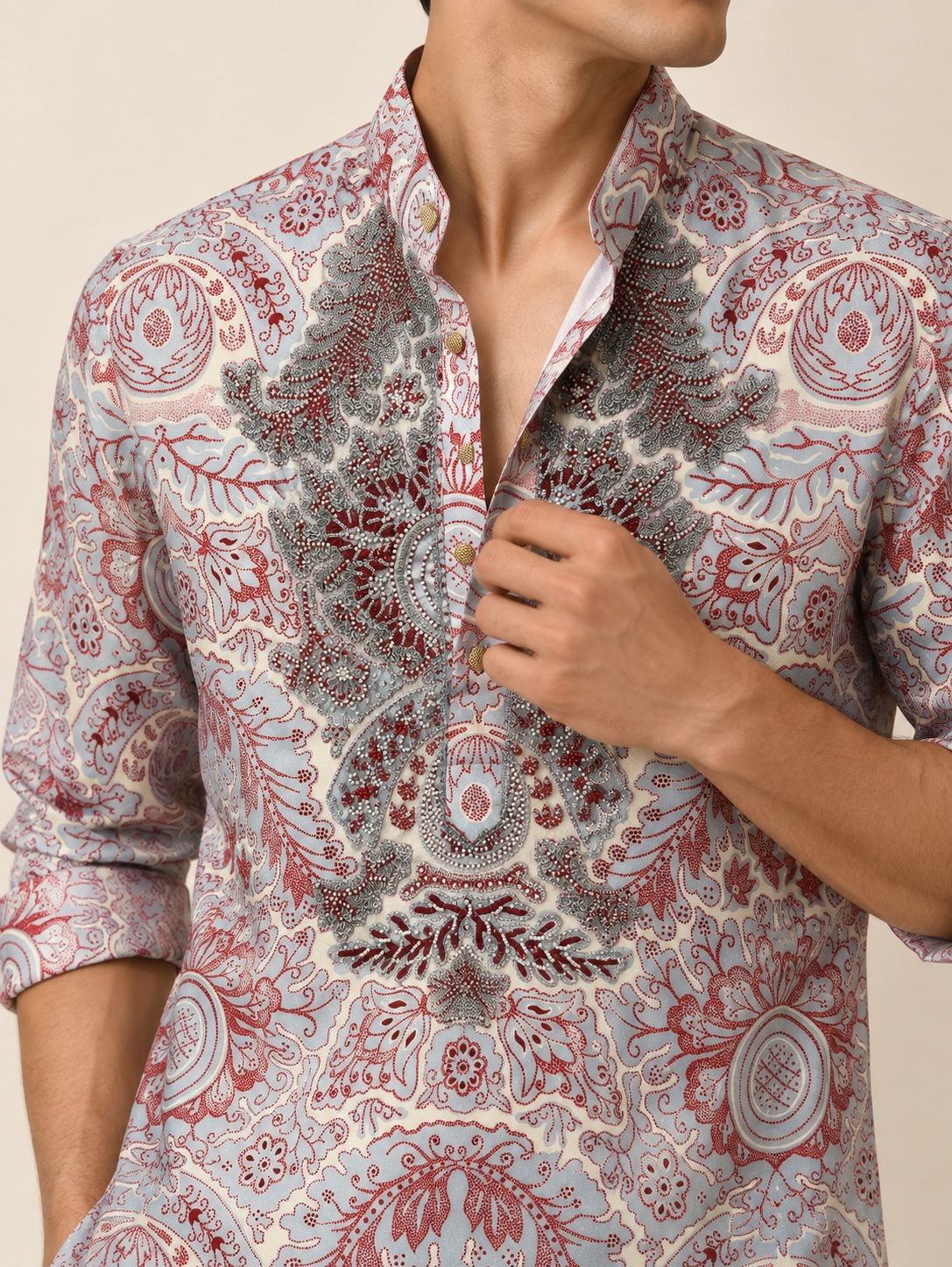 Close-up of sky and rose paisley hand embroidery on Japanese satin kurta